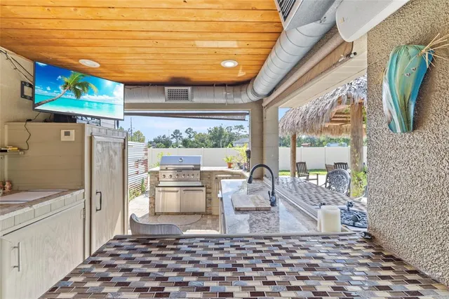 a view of a patio with a yard