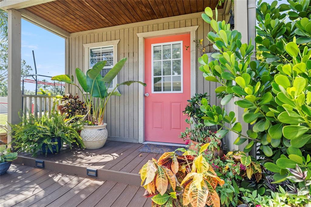 5031 Lakewood Road Sebring, FL 33875 - Photo 57 of 77 a potted plant sitting in front of a house
