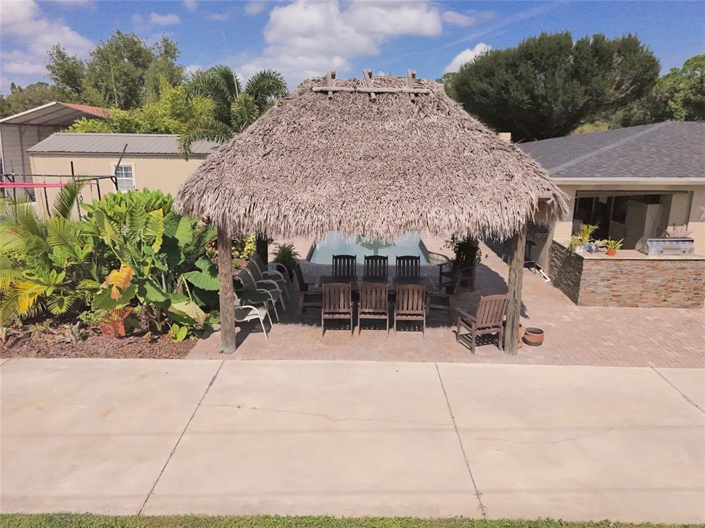 5031 Lakewood Road Sebring, FL 33875 - Photo 67 of 77 a view of a patio with a yard