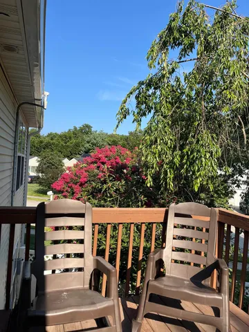a view of a terrace with outdoor seating