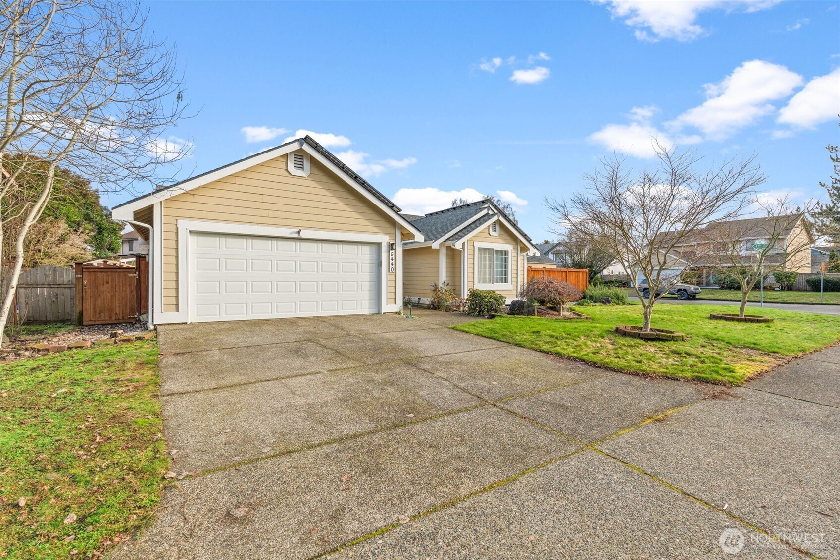 5440 Park Pl Loop Southeast Lacey, WA 98503 - Photo 2 of 36 a view of house with yard and garage