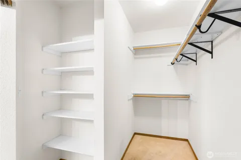 a view of small space with racks on the wall