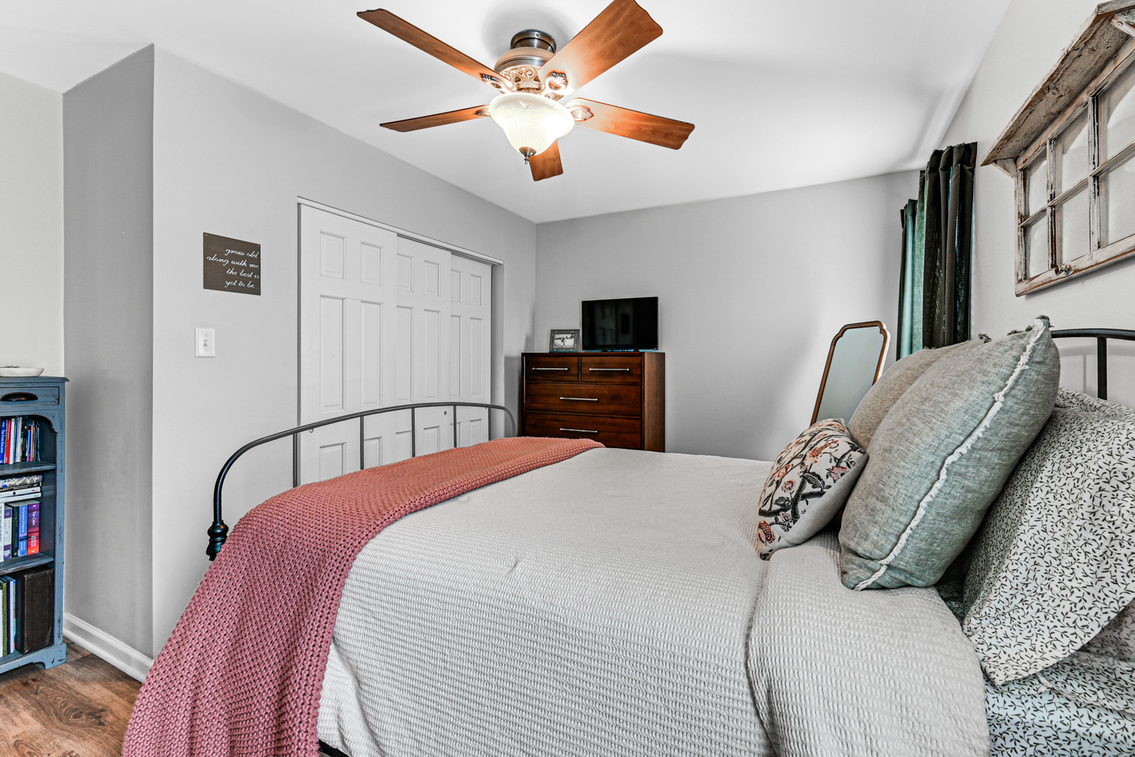 20607 South Acorn Ridge Drive Frankfort, IL 60423 - Photo 14 of 18 a bedroom with a large bed and a chandelier