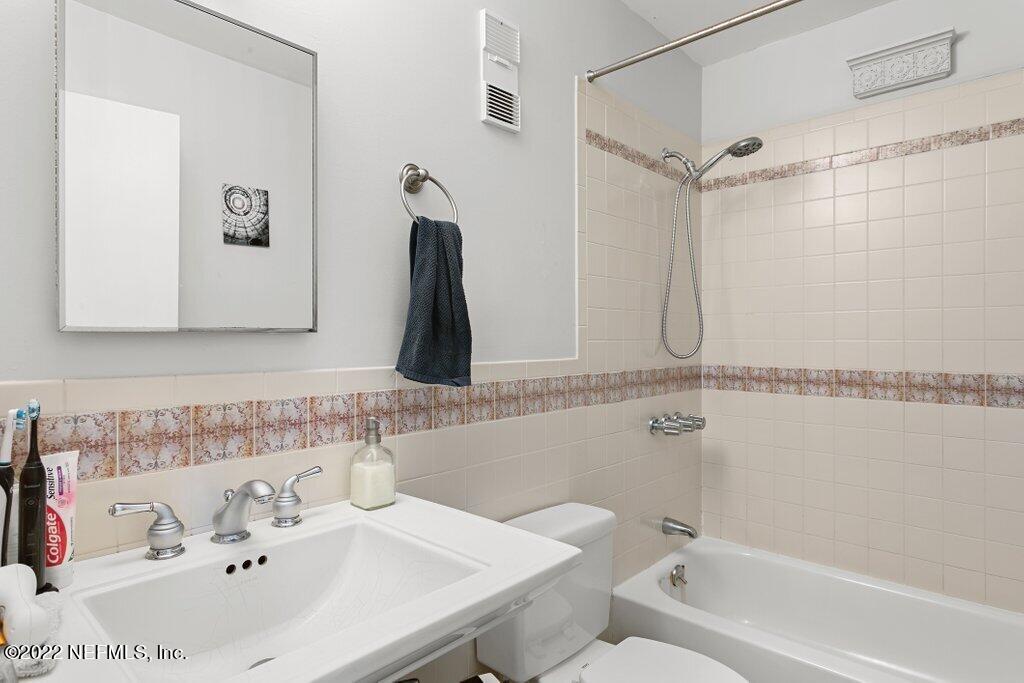 700 West Pope Road, Unit A6 St. Augustine, FL 32080 - Photo 16 of 25 a bathroom with a sink and a bathtub