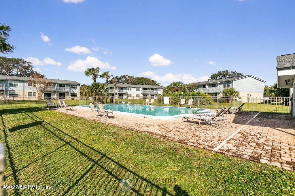 700 West Pope Road, Unit A6 St. Augustine, FL 32080 - Photo 24 of 25 a view of swimming pool with outdoor seating