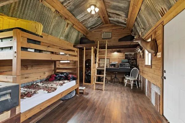 a view of outdoor space with wooden floor and stairs