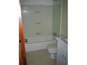 4263 Pima Way Rimrock, AZ 86335 - Photo 8 of 10 a bathroom with a toilet and a bath tub