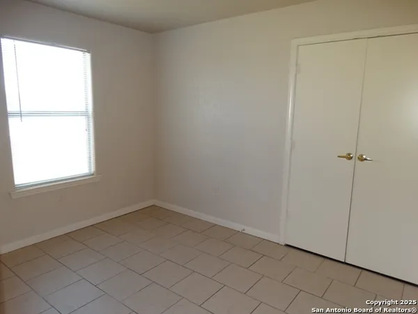 an empty room with a window