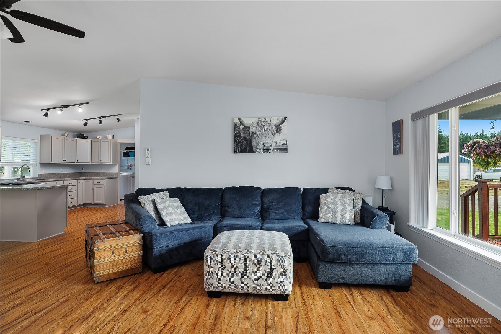 8336 178th Avenue Southwest Rochester, WA 98579 - Photo 13 of 39 a living room with furniture and a wooden floor