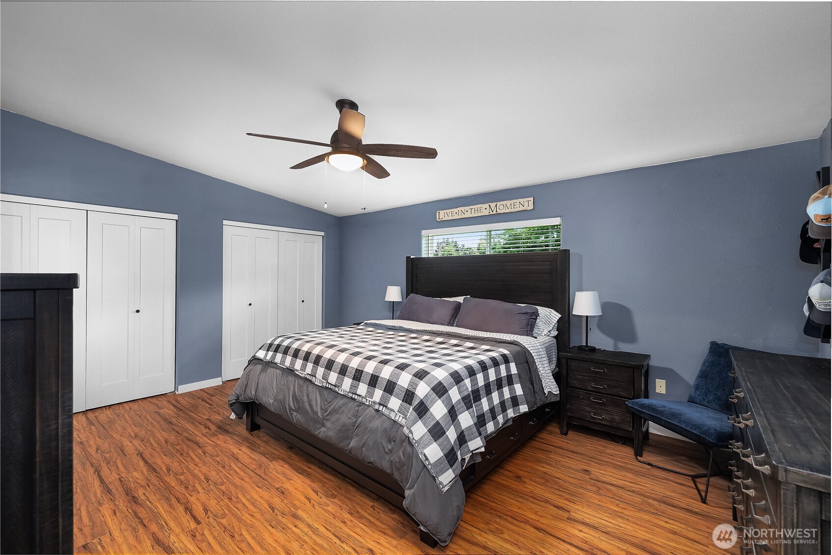 8336 178th Avenue Southwest Rochester, WA 98579 - Photo 17 of 39 a bedroom with a bed and wooden floor
