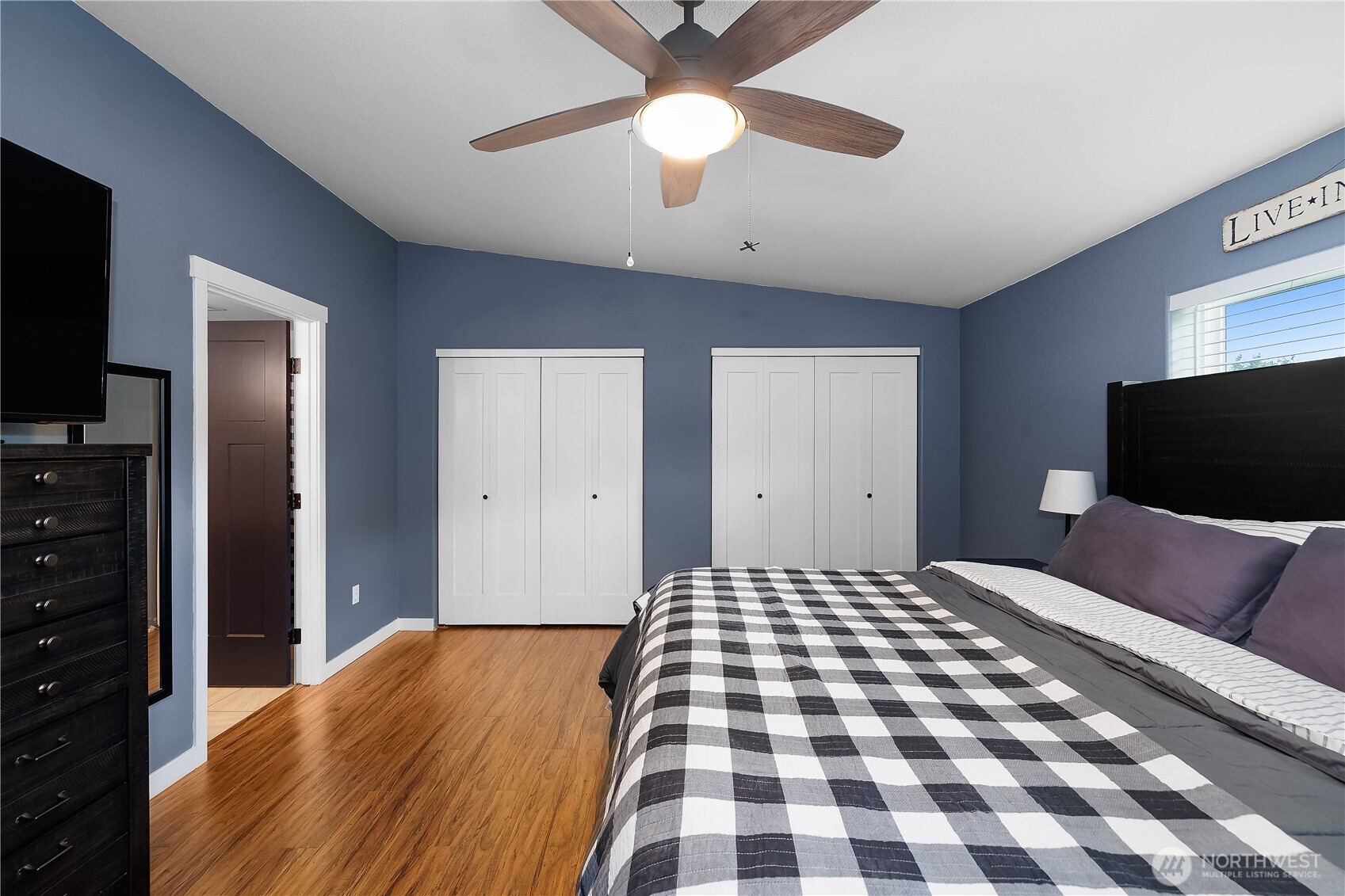 8336 178th Avenue Southwest Rochester, WA 98579 - Photo 18 of 39 a bedroom with a bed and a flat screen tv