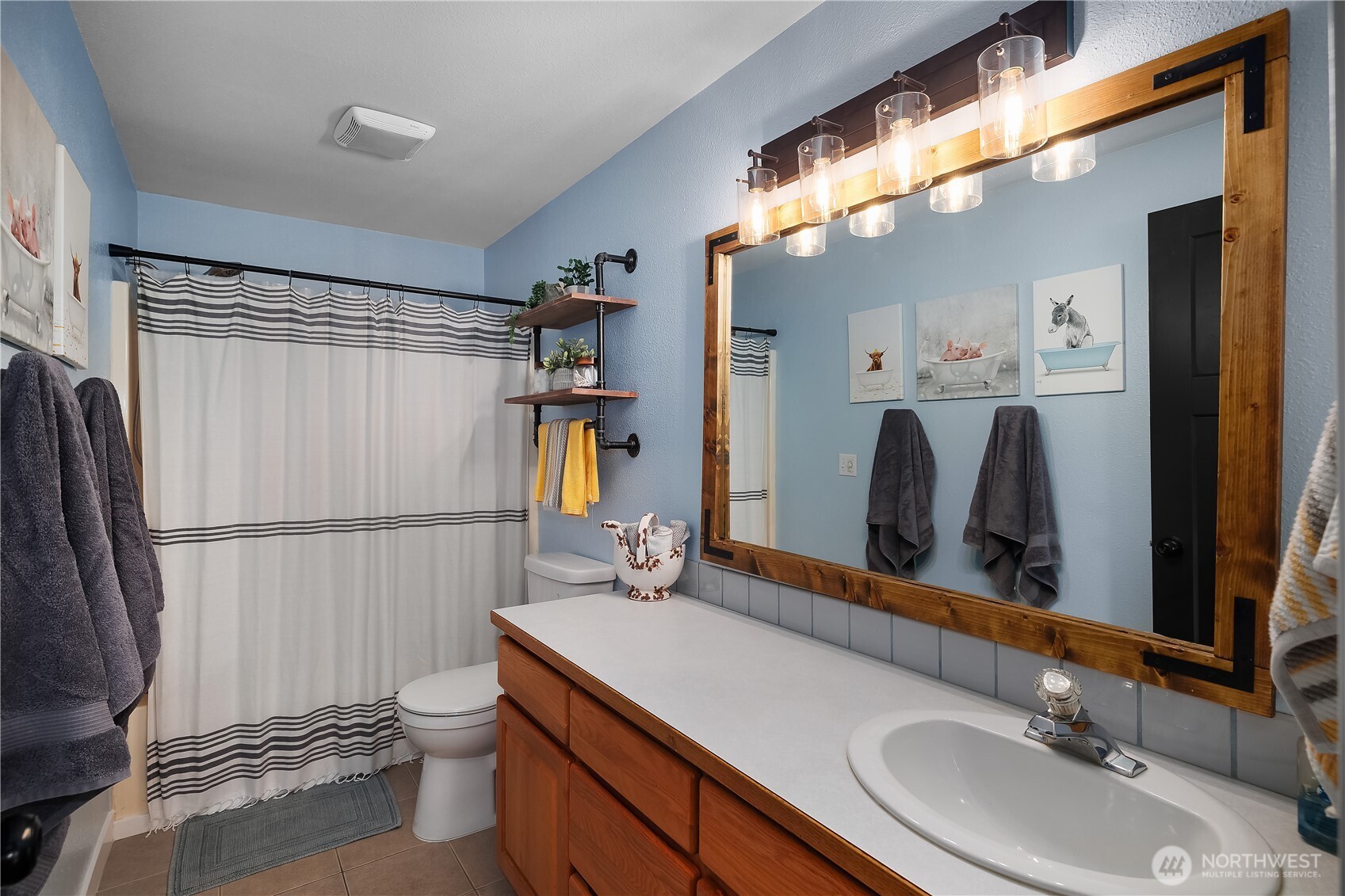 8336 178th Avenue Southwest Rochester, WA 98579 - Photo 24 of 39 a bathroom with a sink toilet and shower