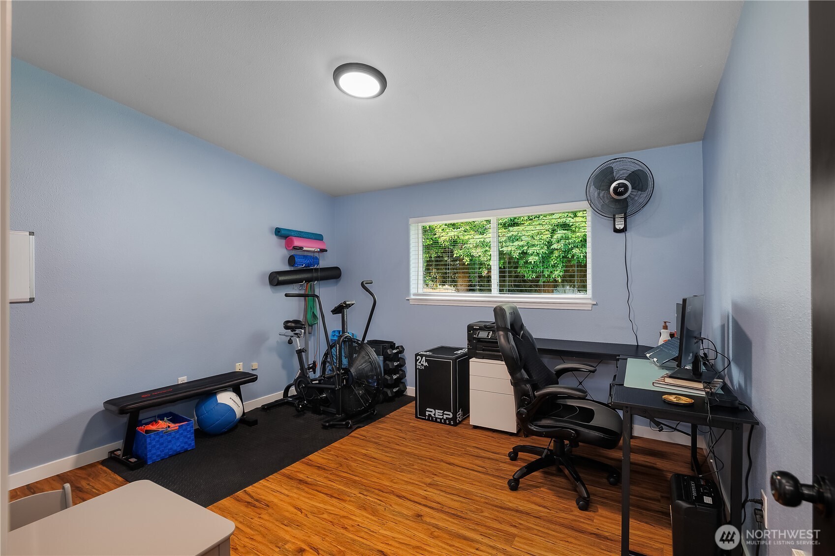 8336 178th Avenue Southwest Rochester, WA 98579 - Photo 25 of 39 a view of a workspace with furniture and a window