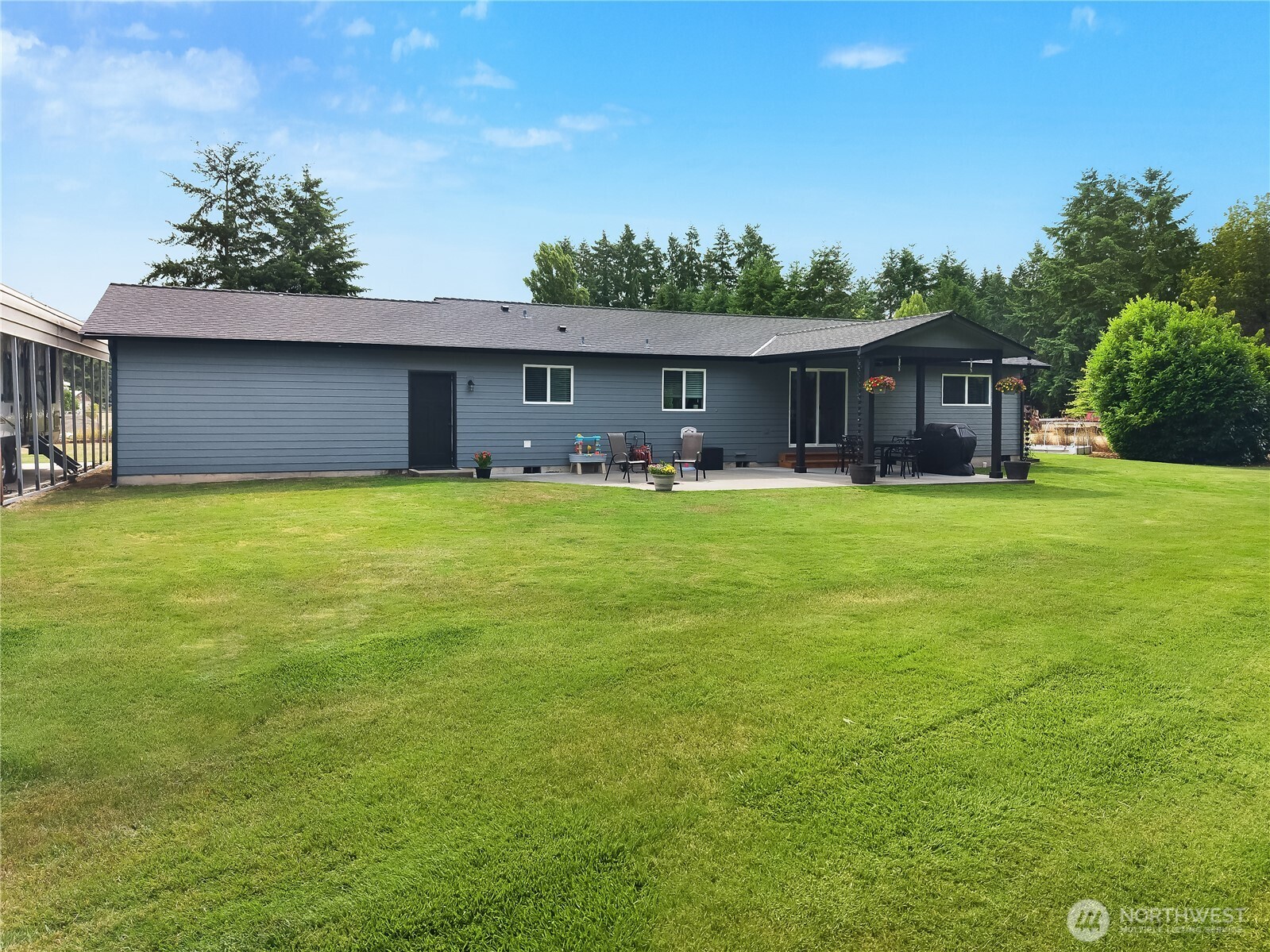8336 178th Avenue Southwest Rochester, WA 98579 - Photo 28 of 39 a view of a house with a yard