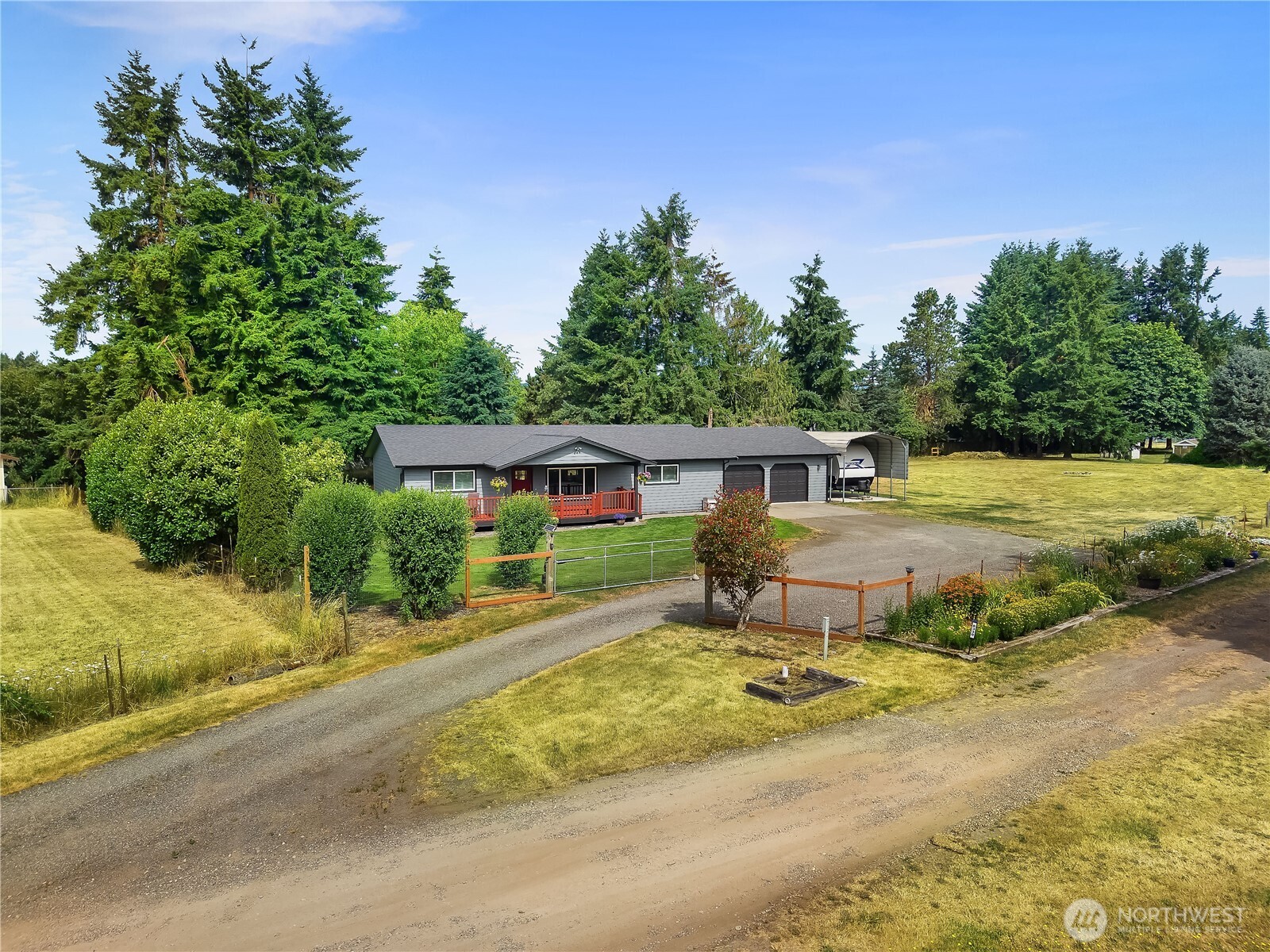8336 178th Avenue Southwest Rochester, WA 98579 - Photo 32 of 39 a front view of a house with a yard
