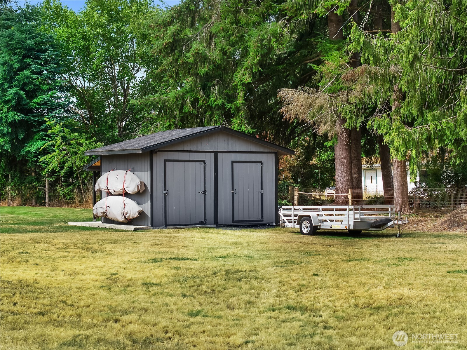 8336 178th Avenue Southwest Rochester, WA 98579 - Photo 34 of 39 a view of a house with backyard and sitting area