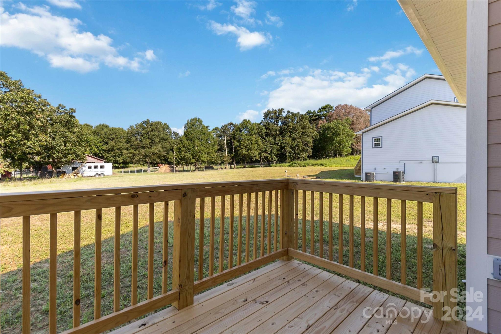 1030 Heath Helms Road Monroe, NC 28110 - Photo 30 of 30 a view of balcony with wooden floor and fence