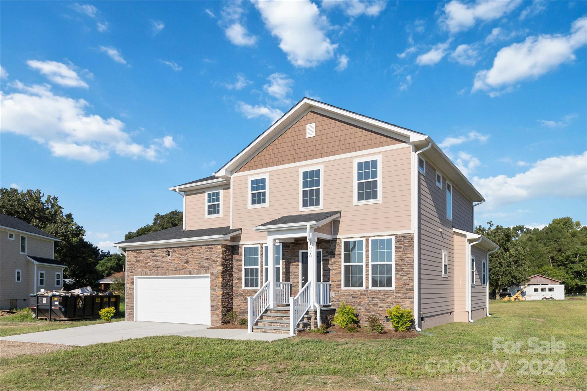 1030 Heath Helms Road Monroe, NC 28110 - Photo 3 of 30 a front view of a house with a yard