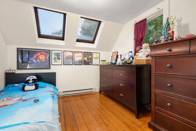 a room with furniture and wooden floor