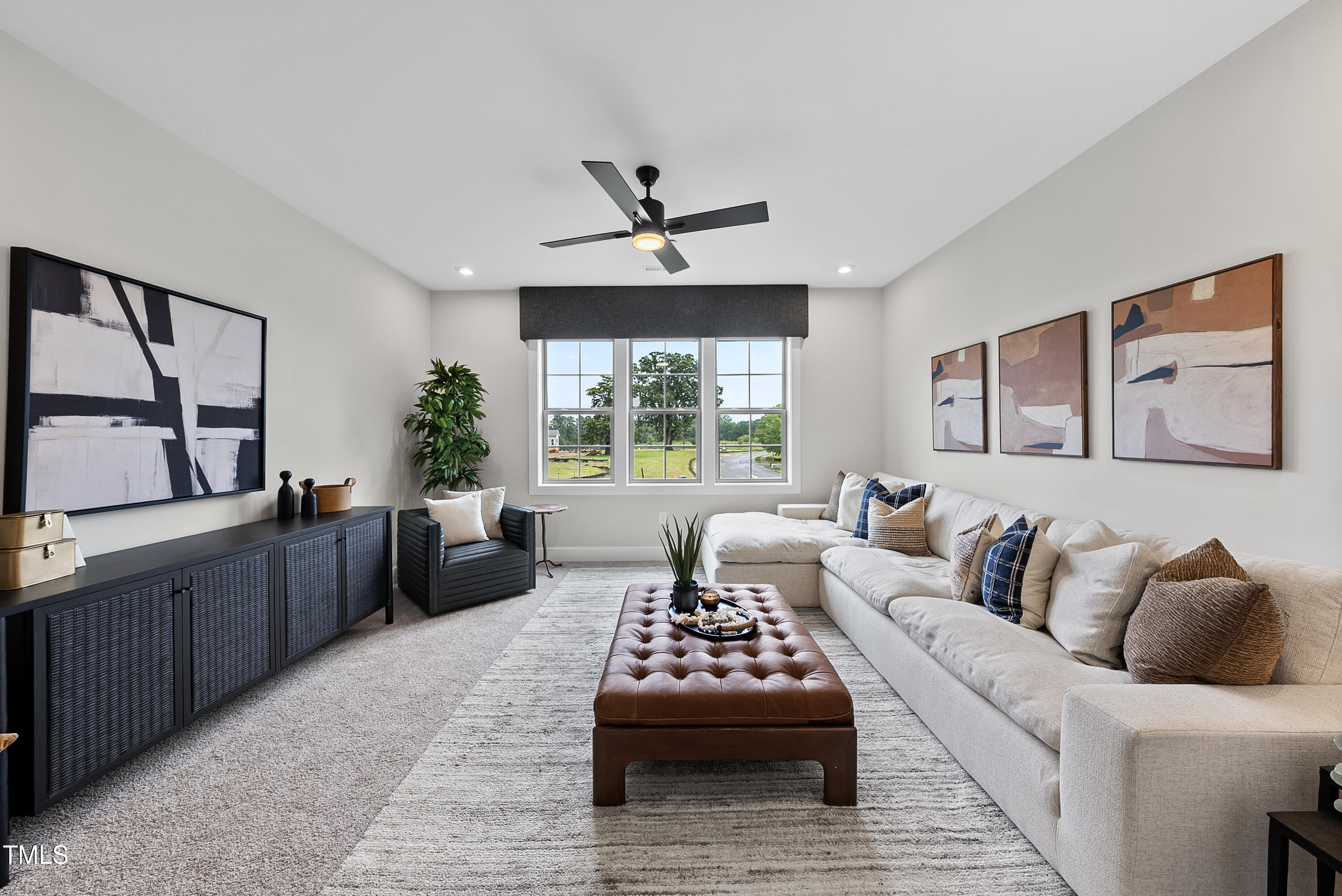 1049 Coldspring Circle Durham, NC 27705 - Photo 15 of 23 a living room with furniture and a large window