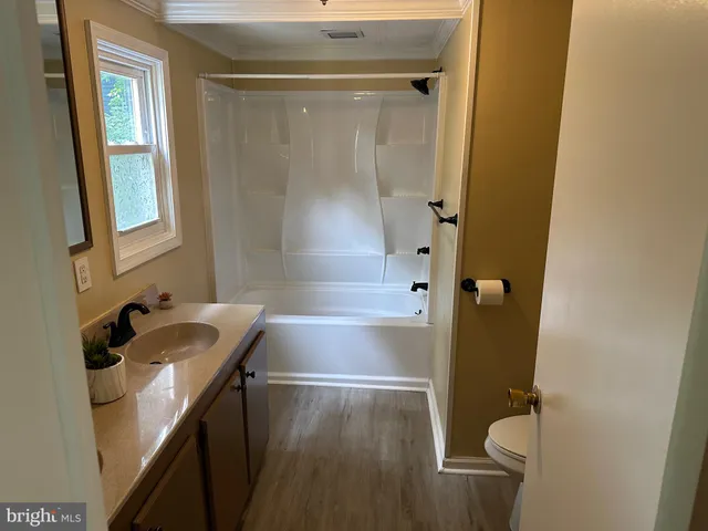 a bathroom with a sink and a tub