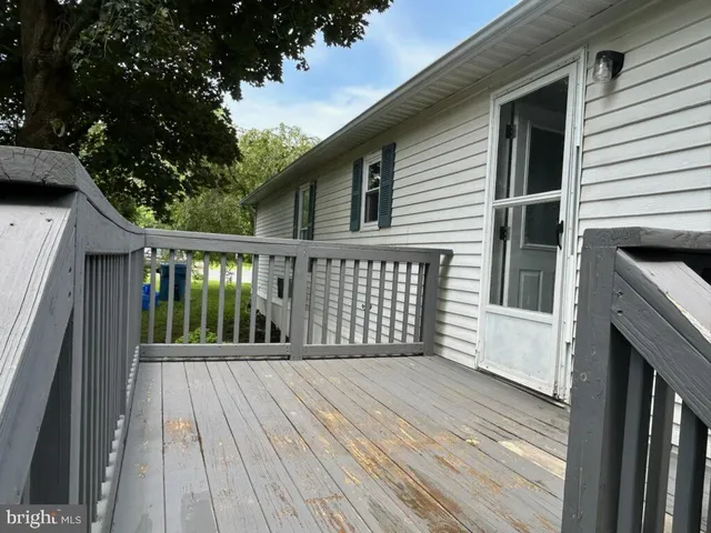 a view of a house with a roof deck