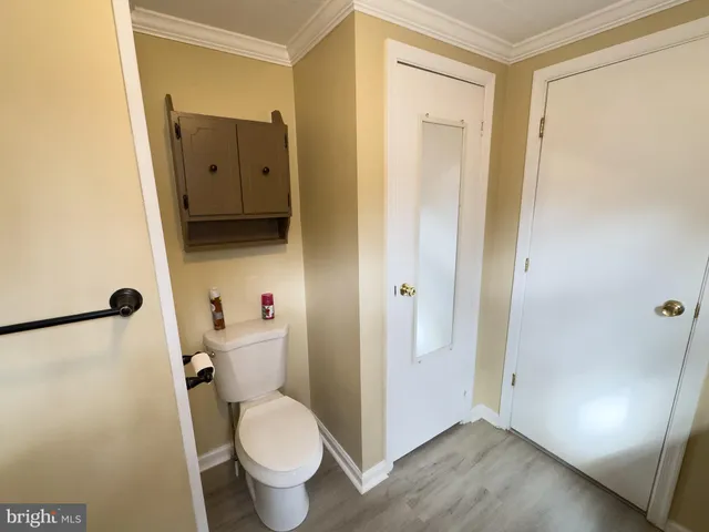 a house with trees in front of it