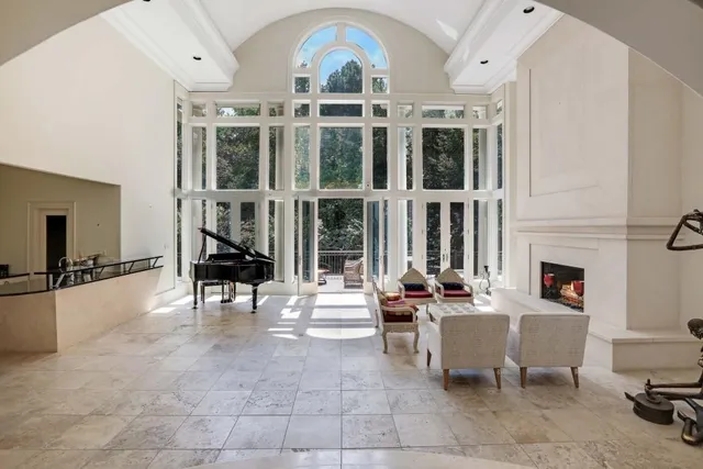 a view of a patio with a dining table and chairs