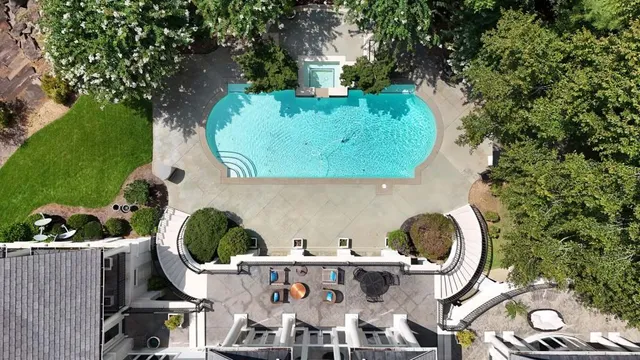 a view of a patio with a small yard