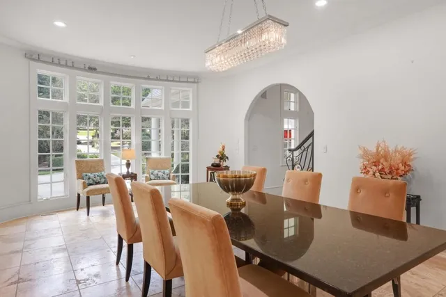 a view of a patio with a table chairs and a table