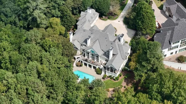front view of a house with a garden