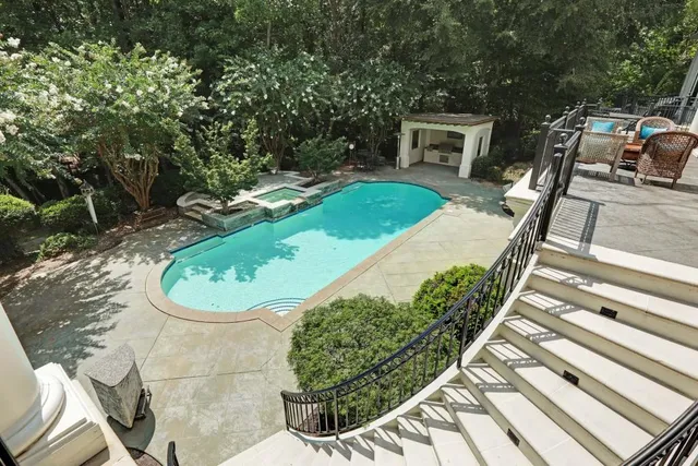 a garden view with a seating space