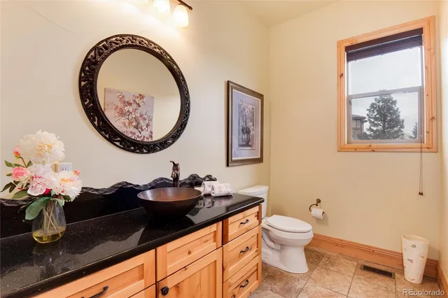 a bathroom with a toilet and a sink