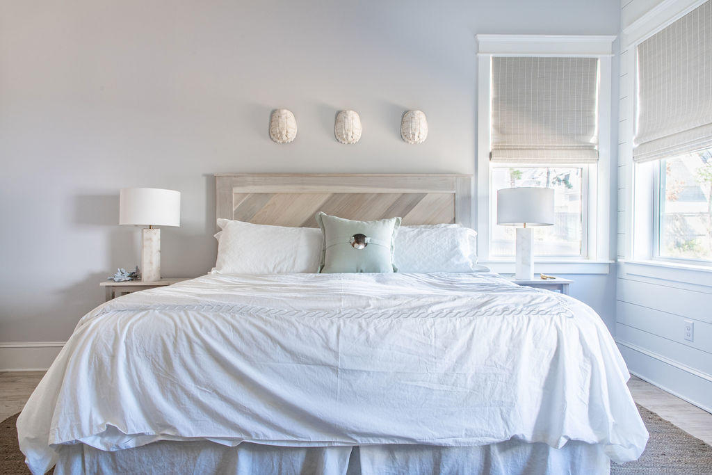 76 West Crabbing Hole Ln Inlet Beach Inlet Beach, FL 32461 - Photo 15 of 86 a bedroom with a bed and a night stand