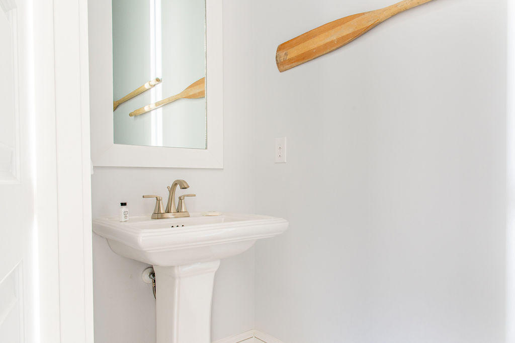 76 West Crabbing Hole Ln Inlet Beach Inlet Beach, FL 32461 - Photo 27 of 86 a bathroom with a sink and a mirror