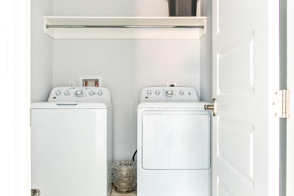 76 West Crabbing Hole Ln Inlet Beach Inlet Beach, FL 32461 - Photo 29 of 86 a utility room with dryer and washer