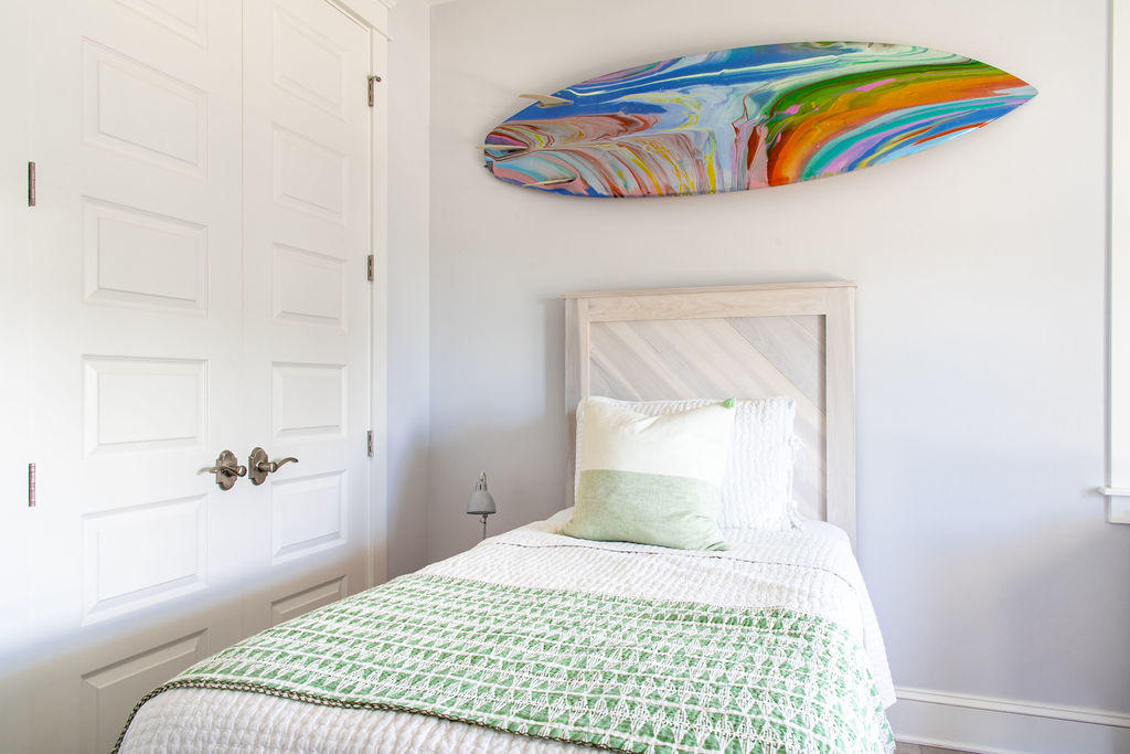 76 West Crabbing Hole Ln Inlet Beach Inlet Beach, FL 32461 - Photo 48 of 86 a bedroom with a bed and a painting on the wall