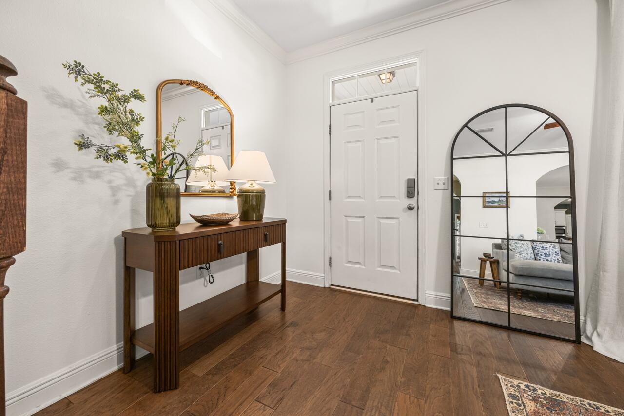 120 Mosaic Oaks Circle Santa Rosa Beach, FL 32459 - Photo 13 of 47 a view of living room filled with furniture and wooden floor