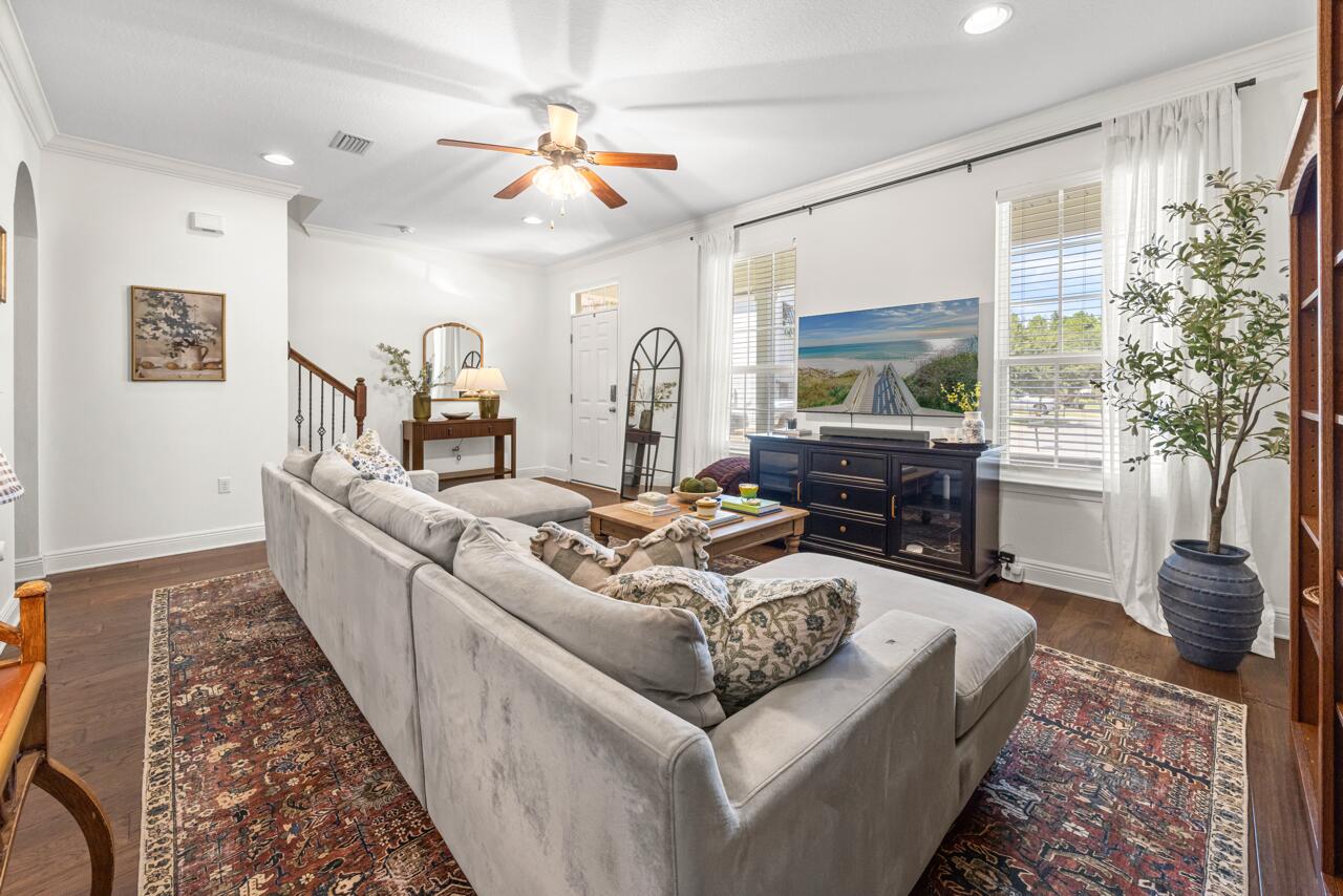 120 Mosaic Oaks Circle Santa Rosa Beach, FL 32459 - Photo 15 of 47 a living room with furniture and a large window