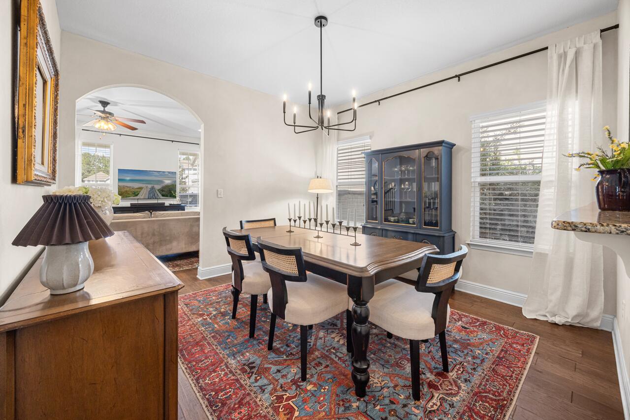 120 Mosaic Oaks Circle Santa Rosa Beach, FL 32459 - Photo 17 of 47 a dining room with furniture and window