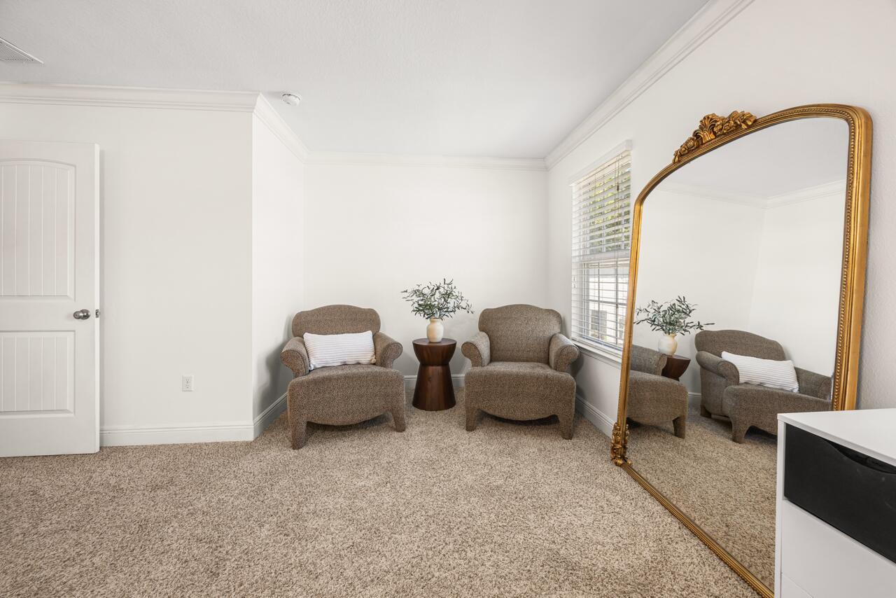 120 Mosaic Oaks Circle Santa Rosa Beach, FL 32459 - Photo 29 of 47 a living room with furniture and a window