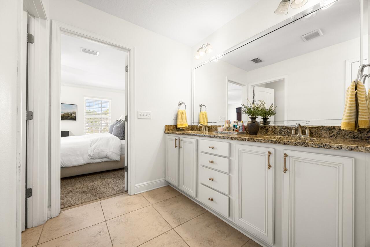 120 Mosaic Oaks Circle Santa Rosa Beach, FL 32459 - Photo 33 of 47 a en suite bathroom with sink double vanity