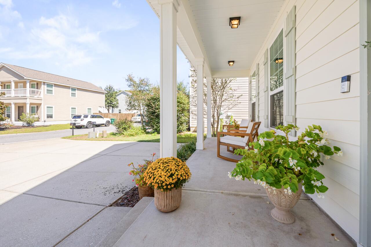 120 Mosaic Oaks Circle Santa Rosa Beach, FL 32459 - Photo 4 of 47 a lobby with furniture and garden
