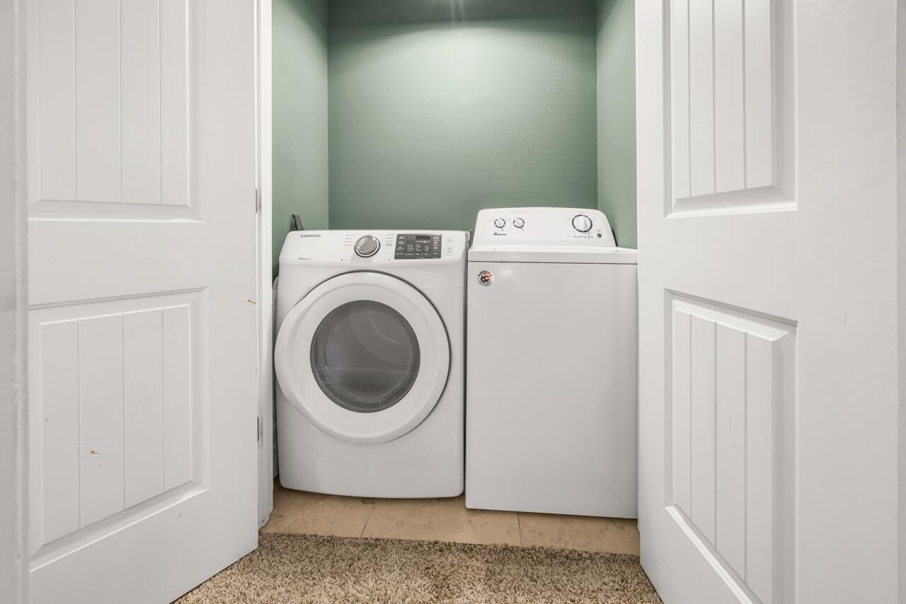 120 Mosaic Oaks Circle Santa Rosa Beach, FL 32459 - Photo 42 of 47 a utility room with dryer and washer
