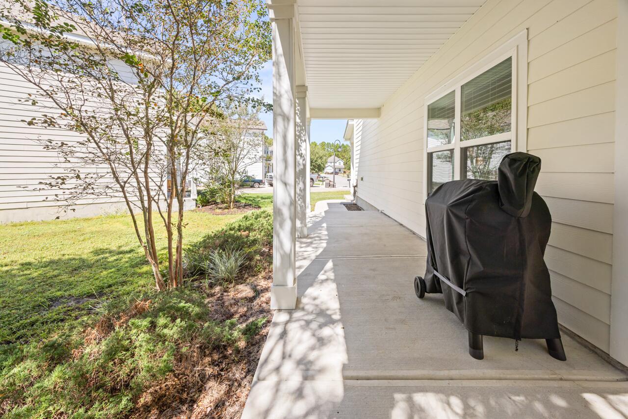 120 Mosaic Oaks Circle Santa Rosa Beach, FL 32459 - Photo 7 of 47 a view of a workspace with furniture and a yard