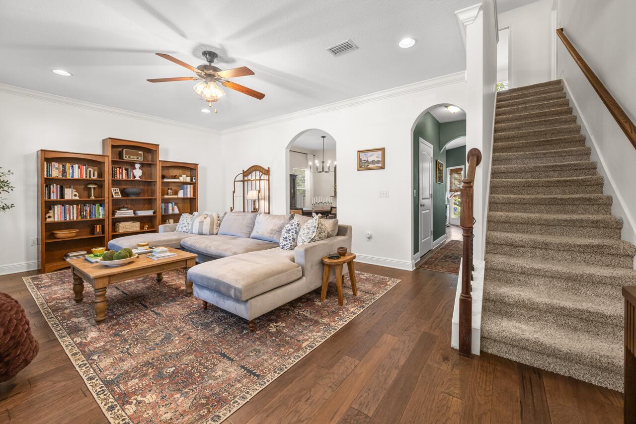120 Mosaic Oaks Circle Santa Rosa Beach, FL 32459 - Photo 10 of 47 a living room with furniture and wooden floor
