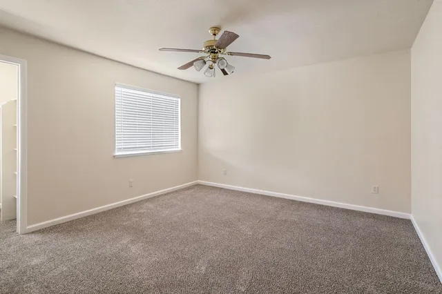 a kitchen with sink and cabinets