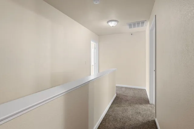 a view of a backyard with a garden