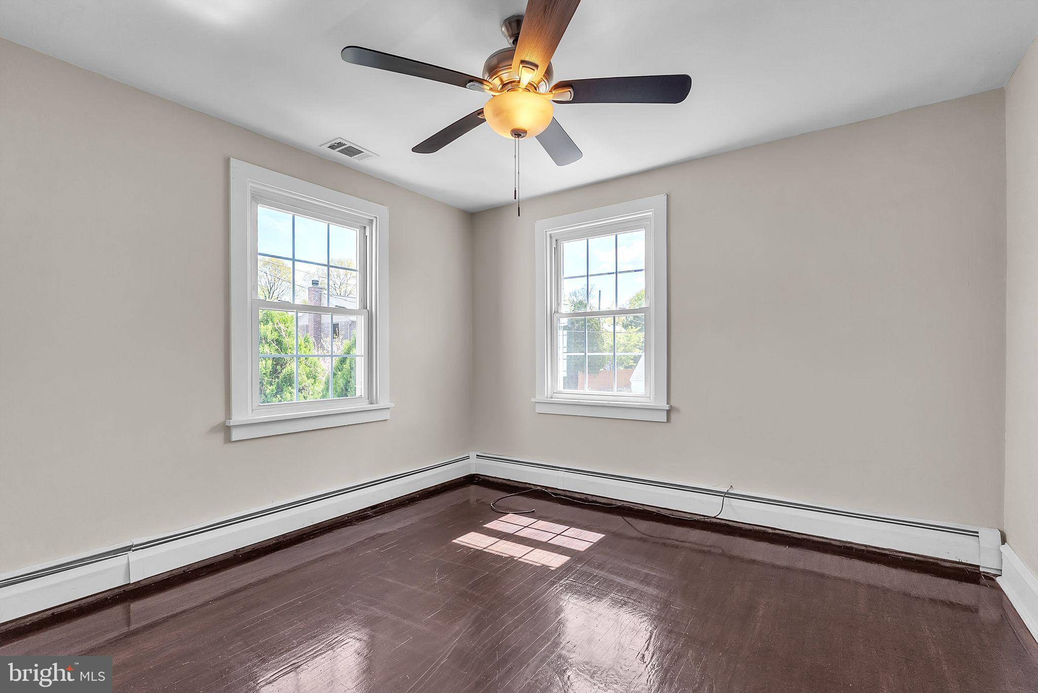 107 East Springfield Road Springfield, PA 19064 - Photo 26 of 40 a view of an empty room with a window