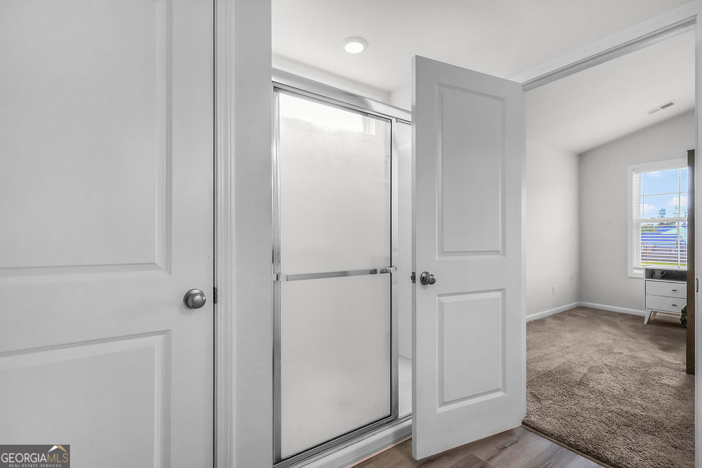 231 Caroline Way Guyton, GA 31312 - Photo 24 of 47 a view of a hallway with closet area